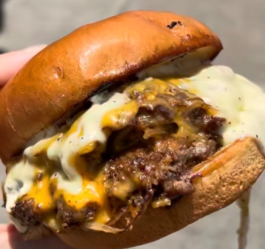 Cheeseburger and fries fresh from the grill